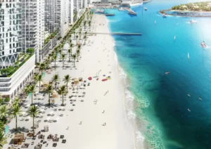 Beach Vista at Emaar Beachfront by Emaar private beach coastline with palm lined promenade sun loungers and clear turquoise water in Dubai - Presented by Tohid Fetrat