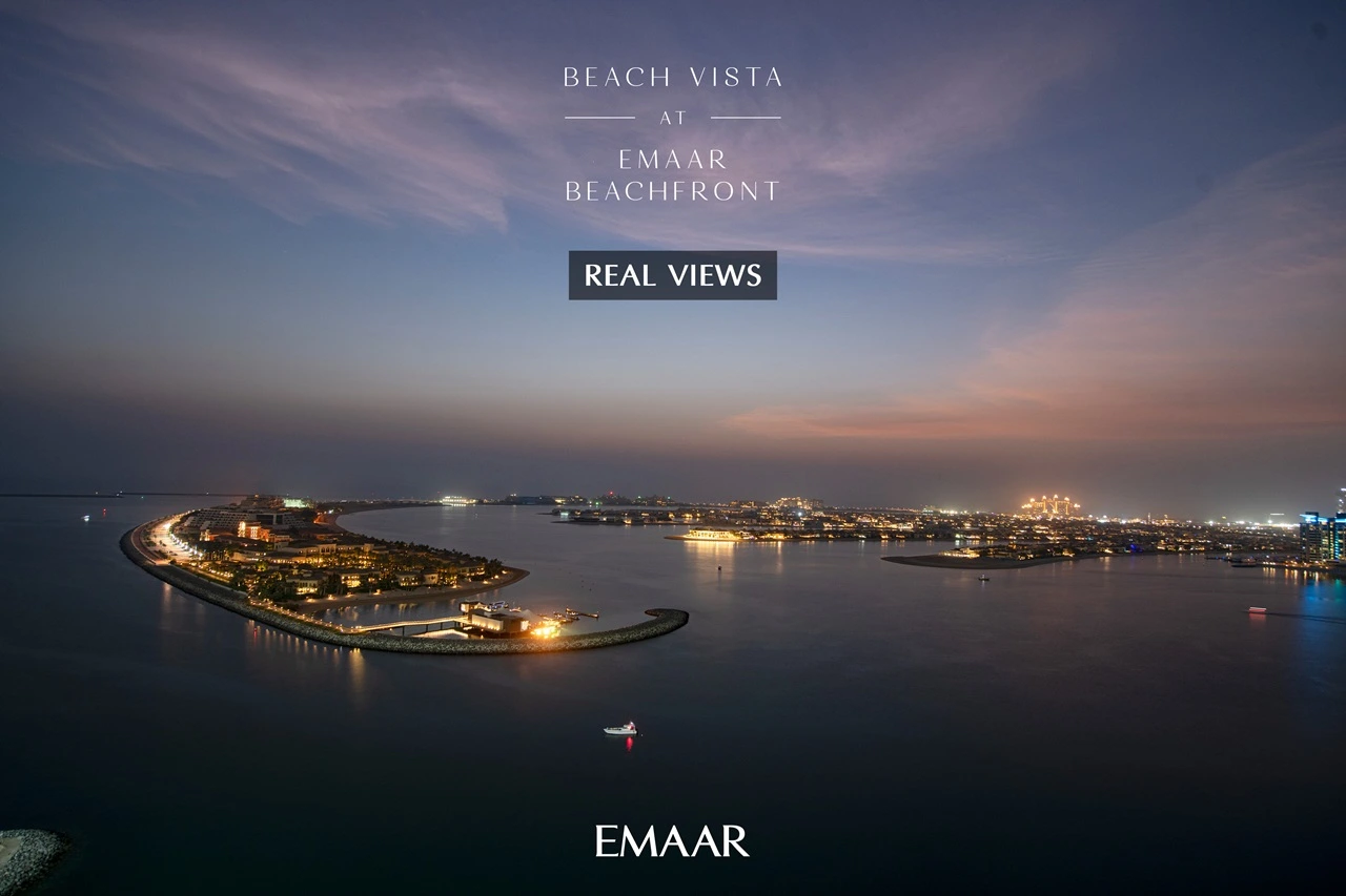 Beach Vista at Emaar Beachfront by Emaar real views over Palm coastline and illuminated waterfront skyline at sunset in Dubai - Presented by Tohid Fetrat
