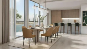 Beachgate by Address at Emaar Beachfront by Emaar dining area and open kitchen with floor to ceiling windows and sea view in Dubai - Presented by Tohid Fetrat