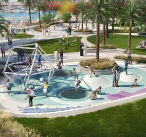 Beachgate by Address at Emaar Beachfront by Emaar landscaped park with children playground climbing structure and waterfront promenade in Dubai - Presented by Tohid Fetrat