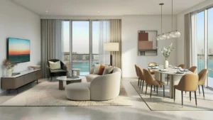 Beachgate by Address at Emaar Beachfront by Emaar open plan living and dining area with floor to ceiling windows and sea view in Dubai - Presented by Tohid Fetrat
