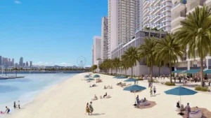 Beachgate by Address at Emaar Beachfront by Emaar private sandy beach with palm lined promenade sun umbrellas and waterfront skyline in Dubai - Presented by Tohid Fetrat