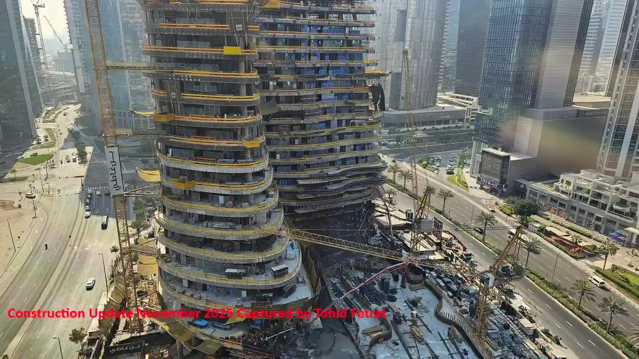 Bugatti by Binghatti construction update in November 2025 showing curved tower structure with active cranes and foundation works in Dubai - Captured by Tohid Fetrat