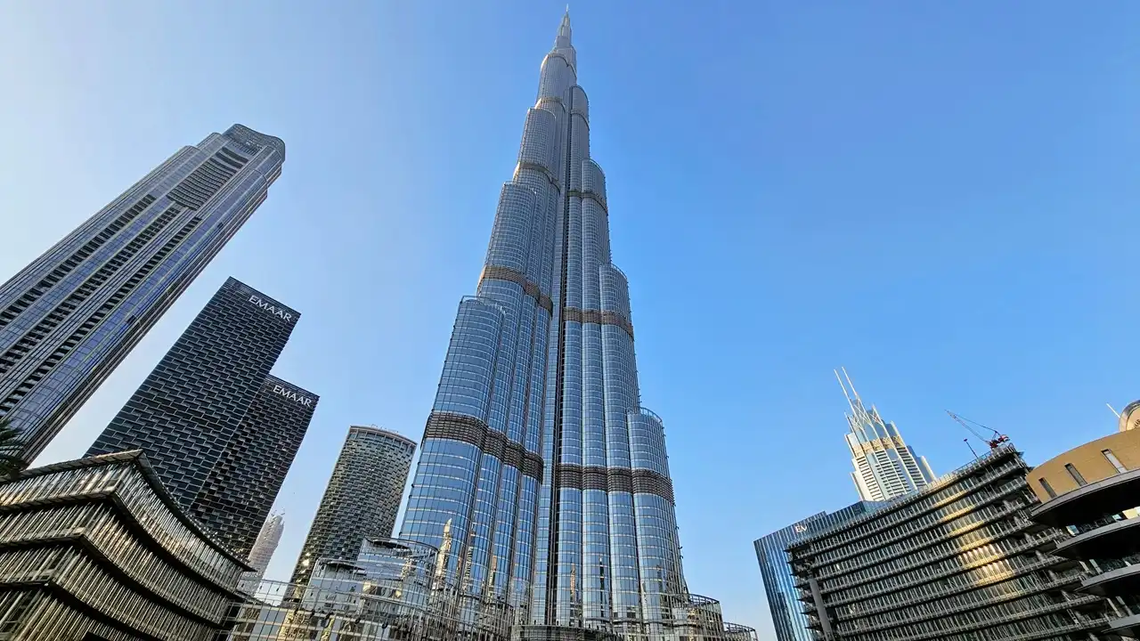 Burj Khalifa and Downtown Dubai skyline representing buying property in Dubai prime real estate location - Presented by Tohid Fetrat