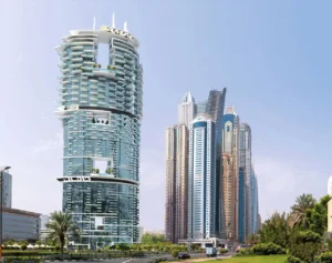 Cavalli Tower by DAMAC modern exterior architecture with curved balconies and glass facade in Dubai skyline - Presented by Tohid Fetrat
