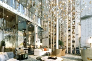 Cavalli Tower by DAMAC grand lobby with hanging crystal installations double height space and luxury seating in Dubai - Presented by Tohid Fetrat