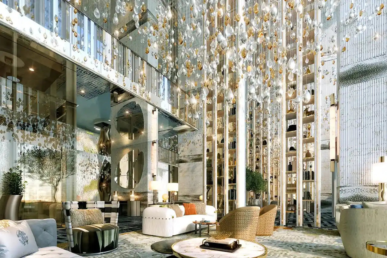 Cavalli Tower by DAMAC grand lobby with hanging crystal installations double height space and luxury seating in Dubai - Presented by Tohid Fetrat
