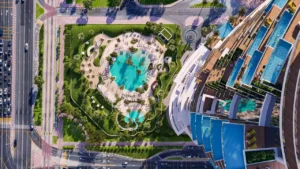 Cavalli Tower by DAMAC aerial view of landscaped pool area with pathways greenery and leisure spaces in Dubai - Presented by Tohid Fetrat