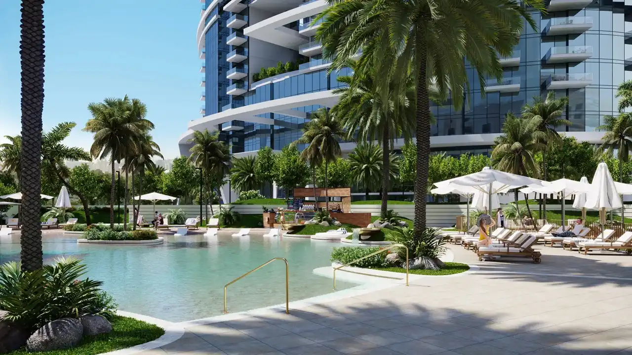 Cavalli Tower by DAMAC outdoor pool area with palm trees sun loungers and landscaped surroundings in Dubai - Presented by Tohid Fetrat
