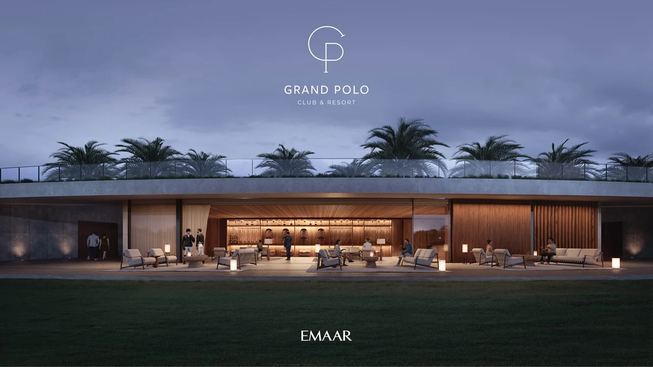 Chevalia Estate 2 at Grand Polo Club & Resort by Emaar clubhouse evening exterior with open lounge seating warm lighting and landscaped surroundings in Dubai Presented by Tohid Fetrat