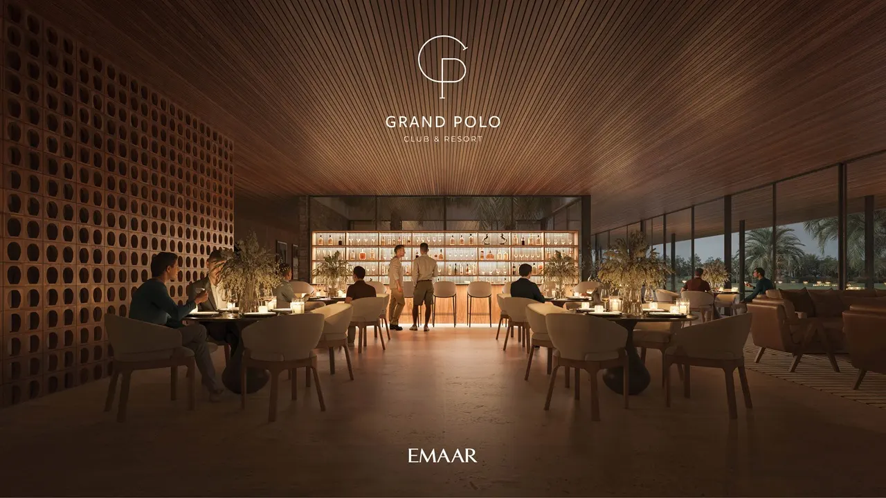 Chevalia Estate 2 at Grand Polo Club & Resort by Emaar clubhouse lounge with elegant seating warm lighting and premium hospitality ambiance in Dubai Presented by Tohid Fetrat