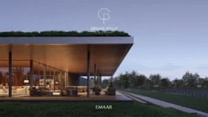Chevalia Estate 2 at Grand Polo Club & Resort by Emaar clubhouse with open terrace warm evening lighting and polo field view in Dubai Presented by Tohid Fetrat