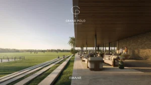 Chevalia Estate 2 at Grand Polo Club & Resort by Emaar polo view terrace with open lounge seating shaded architecture and expansive green field in Dubai Presented by Tohid Fetrat