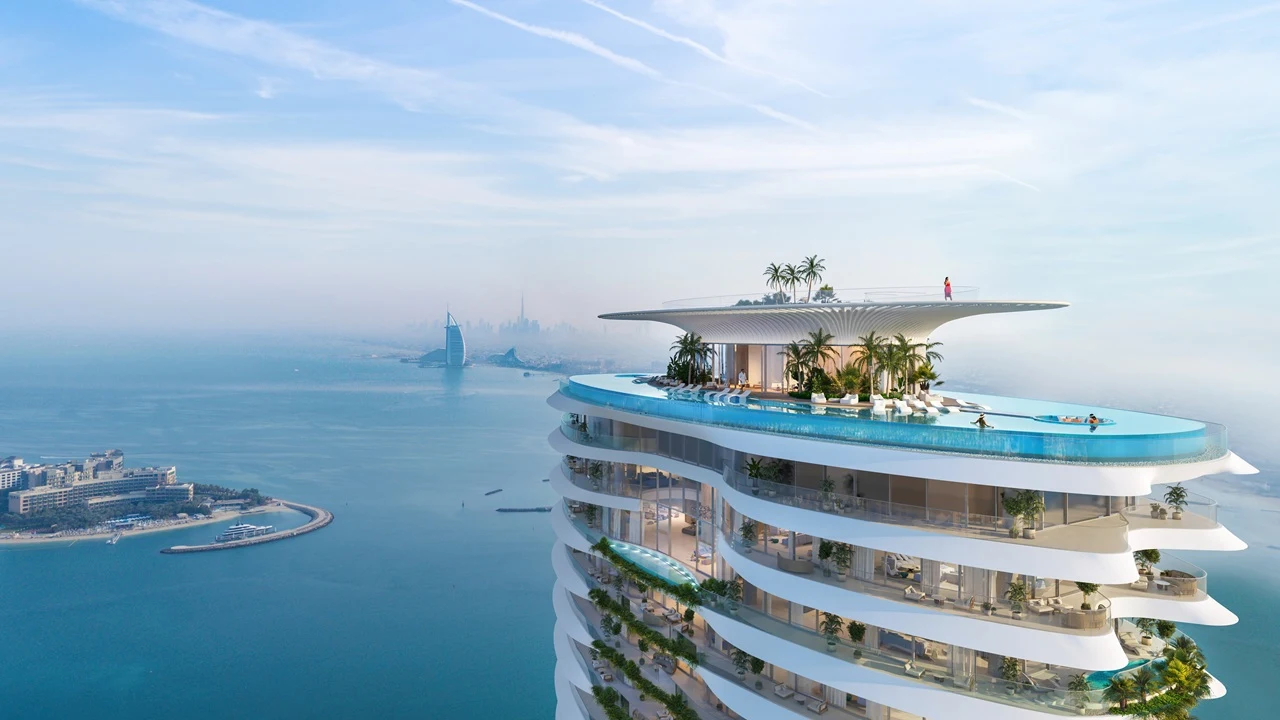 Como Residences construction update February 2023 showing luxury waterfront tower with rooftop infinity pool and panoramic views at Palm Jumeirah Dubai Presented by Tohid Fetrat