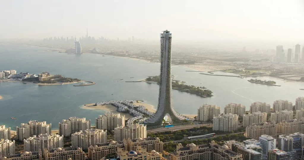 Como Residences construction update at Palm Jumeirah featuring iconic tower with panoramic waterfront skyline view in Dubai Presented by Tohid Fetrat