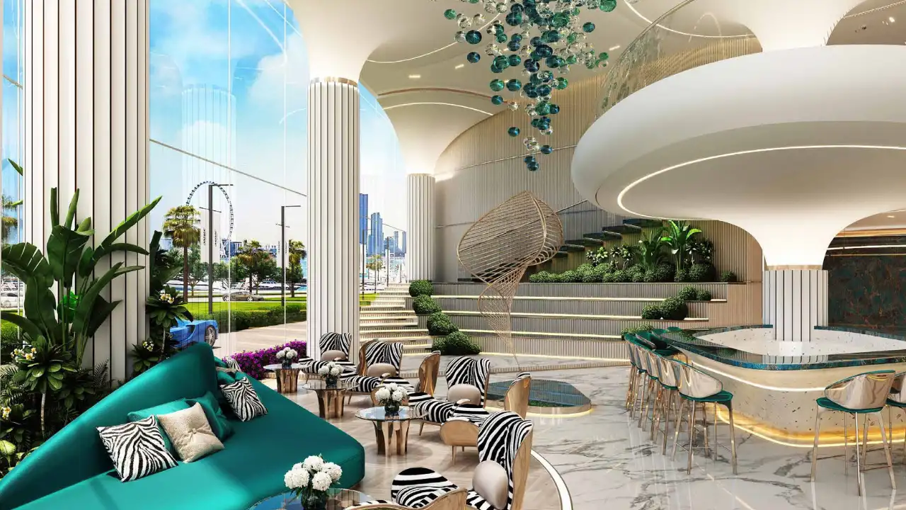 DAMAC Bay by Cavalli luxury lobby interior with marble flooring curved architecture lounge seating and bar area in Dubai - Presented by Tohid Fetrat