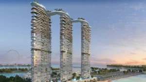 DAMAC Bay by Cavalli waterfront towers with flowing balconies and sky bridge overlooking the Gulf at sunset in Dubai - Presented by Tohid Fetrat