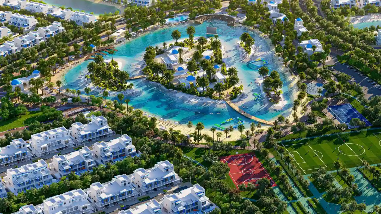 DAMAC Lagoons master community with crystal lagoon waterfront villas sandy beaches palm trees and leisure amenities in Dubai Presented by Tohid Fetrat