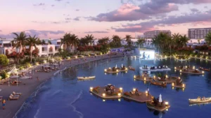 DAMAC Riverside by DAMAC Properties lagoon beach with floating dining decks outdoor cinema screen and waterfront villas at sunset in Dubai - Presented by Tohid Fetrat