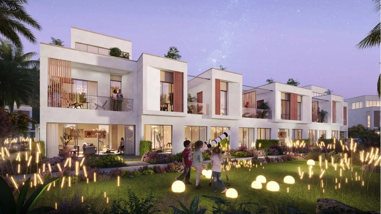 DAMAC Riverside by DAMAC Properties modern villas with landscaped garden ambient lighting and stargazing scene at night in Dubai - Presented by Tohid Fetrat