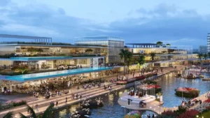 DAMAC Riverside by DAMAC Properties waterfront retail and dining promenade along canal with modern architecture and outdoor seating in Dubai - Presented by Tohid Fetrat