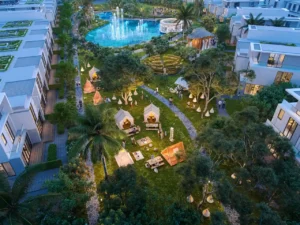 DAMAC Sun City by DAMAC Properties community garden with outdoor seating tents landscaped pathways and lagoon view in Dubai - Presented by Tohid Fetrat