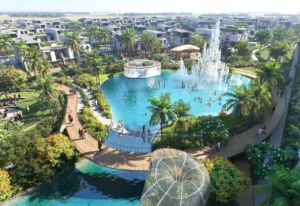 DAMAC Sun City by DAMAC Properties lagoon with fountain water feature landscaped walkways and surrounding villas in Dubai - Presented by Tohid Fetrat