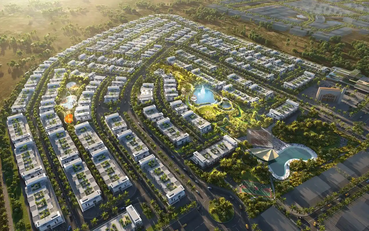 DAMAC Sun City by DAMAC Properties aerial masterplan view showing residential villas landscaped streets and central water features in Dubai - Presented by Tohid Fetrat