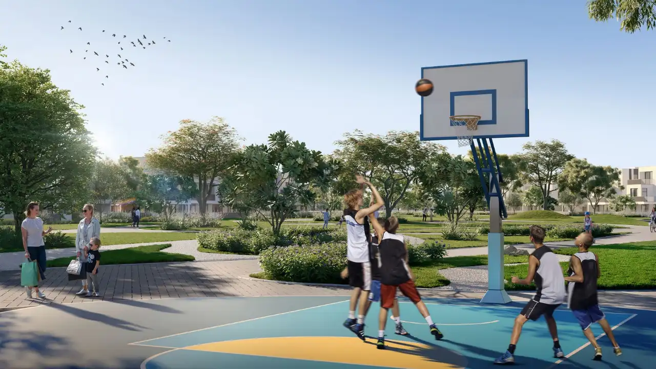 Equiterra at Grand Polo Club and Resort by Emaar outdoor basketball court with landscaped park surroundings and family friendly community space in Dubai - Presented by Tohid Fetrat