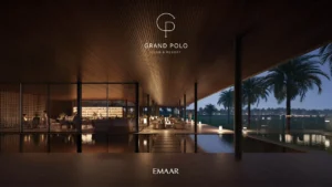 Equiterra at Grand Polo Club and Resort by Emaar luxurious clubhouse terrace with illuminated interiors waterfront reflections and palm views in Dubai - Presented by Tohid Fetrat