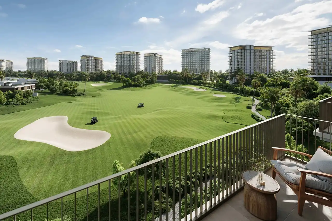 Golf Dale at Emaar South by Emaar apartment balcony overlooking green golf course with surrounding mid rise buildings and landscaped greenery in Dubai - Presented by Tohid Fetrat