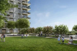 Golf Dale at Emaar South by Emaar landscaped community park with green lawn residential building and families enjoying outdoor space in Dubai - Presented by Tohid Fetrat