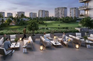 Golf Dale at Emaar South by Emaar outdoor lounge seating area overlooking landscaped golf course with residential buildings in Dubai - Presented by Tohid Fetrat