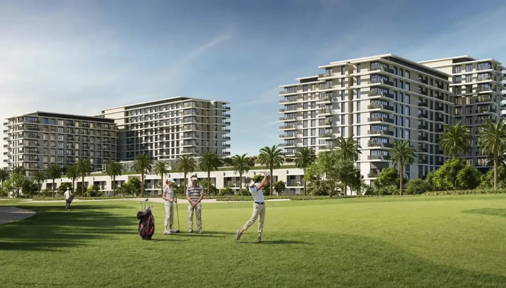 Golf Hills at Emaar South by Emaar residential buildings overlooking golf course with players and landscaped greenery in Dubai - Presented by Tohid Fetrat