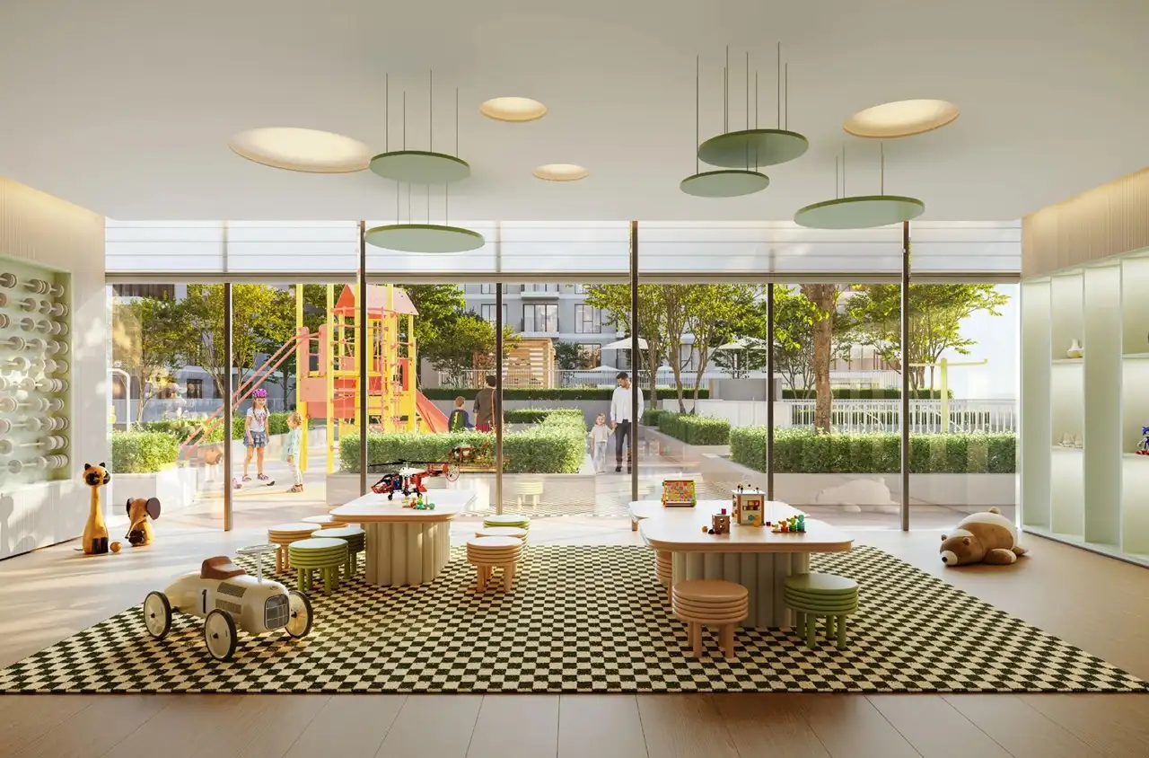 Golf Hills at Emaar South by Emaar indoor kids playroom with toys seating area and garden view in Dubai - Presented by Tohid Fetrat
