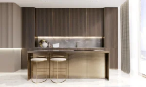 Grand Bleu Tower at Emaar Beachfront by Emaar modern kitchen with gold finish island bar stools marble backsplash and wood cabinetry in Dubai - Presented by Tohid Fetrat