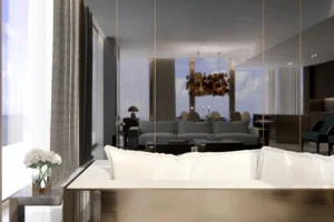 Grand Bleu Tower at Emaar Beachfront by Emaar modern living room with plush seating designer chandelier and floor to ceiling windows in Dubai - Presented by Tohid Fetrat