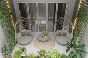 Grandala at Jumeirah Garden City by Palladium Developments balcony seating area with hanging chairs plants and cozy outdoor design in Dubai - Presented by Tohid Fetrat