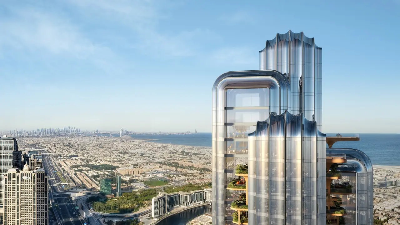 LUMENA by Omniyat office tower upper levels with glass facade overlooking Dubai coastline and cityscape with sea view - Presented by Tohid Fetrat