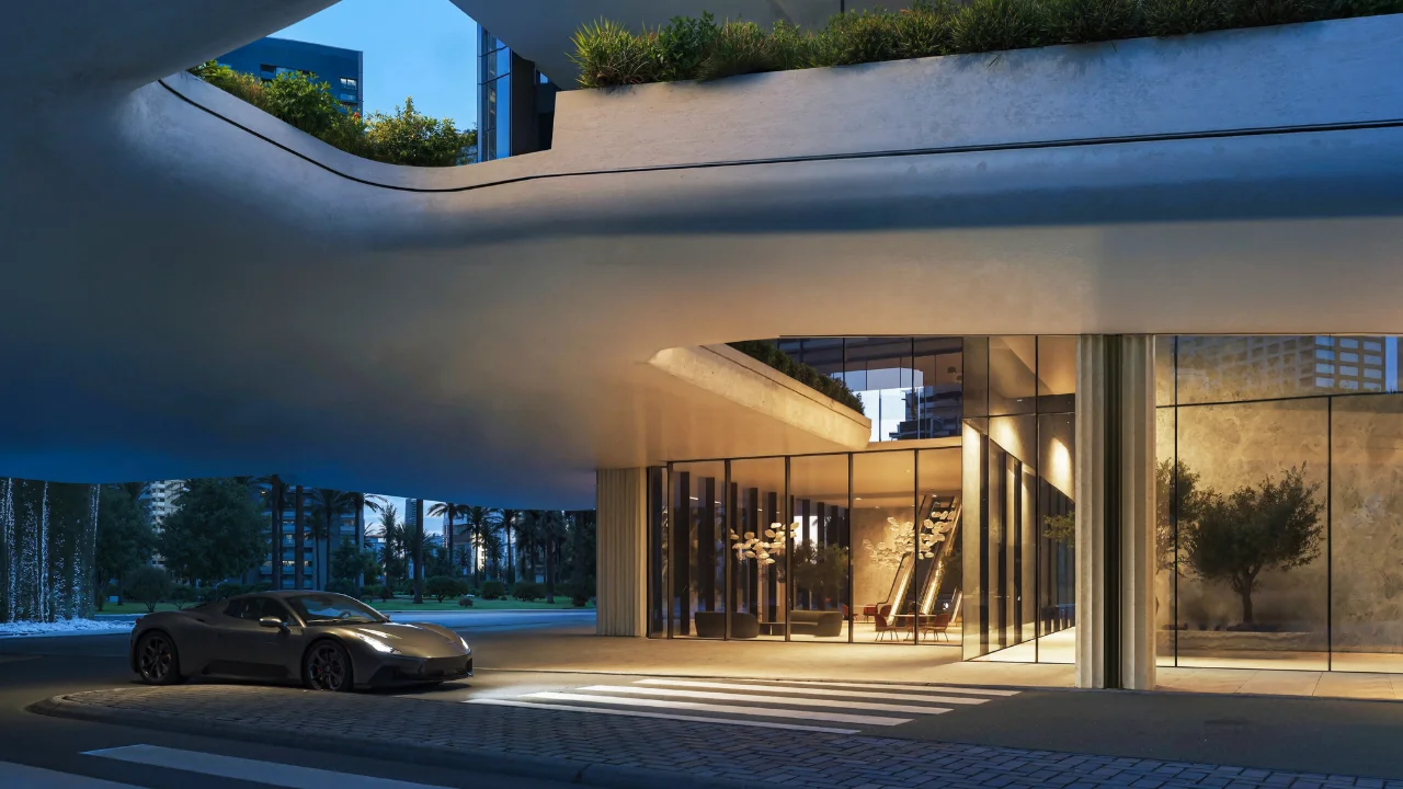 LUMENA by Omniyat office tower main entrance with curved canopy glass facade illuminated lobby and luxury car at drop off in Dubai - Presented by Tohid Fetrat