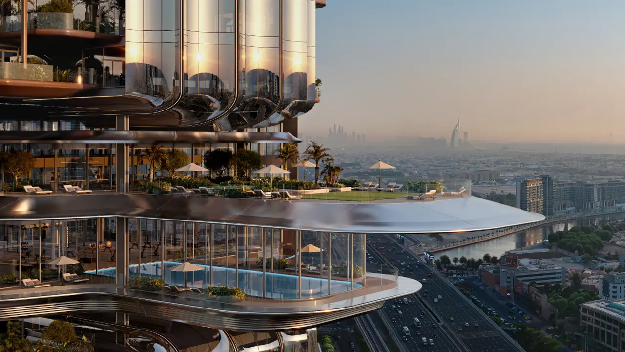 LUMENA by Omniyat office tower sky terrace with pool outdoor lounge and sunrise view over Dubai skyline including Burj Al Arab - Presented by Tohid Fetrat