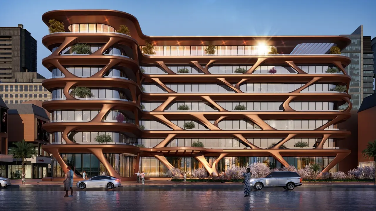 Magnolia Apartments Hotel at Dubai Internet City by Palladium Development illuminated exterior with flowing architectural lines glass facade and landscaped frontage at sunset in Dubai - Presented by Tohid Fetrat