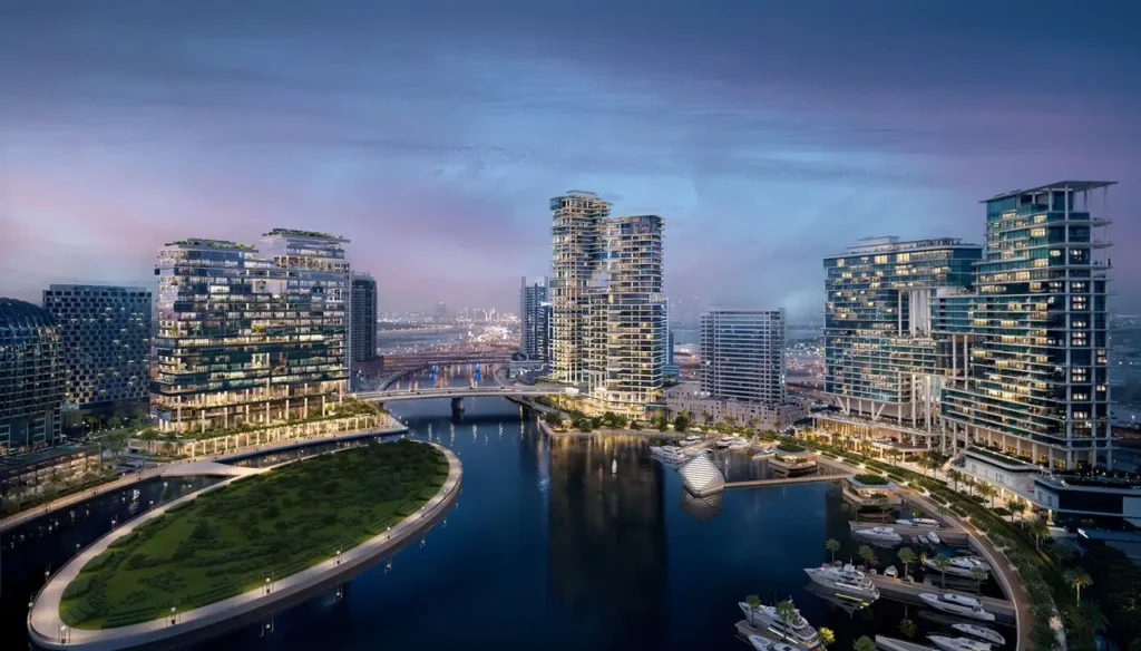 Marasi Bay in Business Bay Dubai at night showing illuminated waterfront canal modern residential towers marina and skyline along Dubai Water Canal Presented by Tohid Fetrat