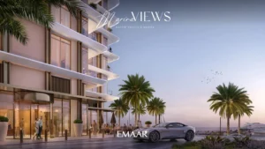 Marina Views at Rashid Yachts and Marina by Emaar residential building entrance with palm trees waterfront seating and luxury car in Dubai - Presented by Tohid Fetrat