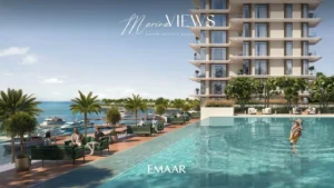 Marina Views at Rashid Yachts and Marina by Emaar infinity pool overlooking marina with yachts palm trees and waterfront seating in Dubai - Presented by Tohid Fetrat
