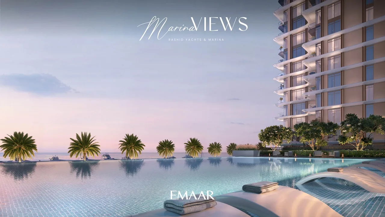 Marina Views at Rashid Yachts and Marina by Emaar infinity pool at sunset with palm trees waterfront and residential tower facade in Dubai - Presented by Tohid Fetrat