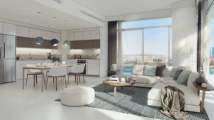 Marina Vista at Emaar Beachfront by Emaar open plan living room and kitchen with large windows and city and sea views in Dubai - Presented by Tohid Fetrat