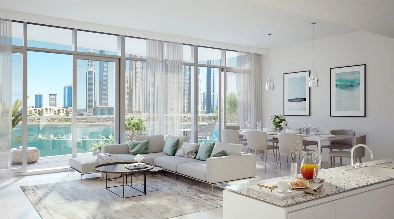 Marina Vista at Emaar Beachfront by Emaar open plan living room with floor to ceiling windows and waterfront skyline view in Dubai - Presented by Tohid Fetrat
