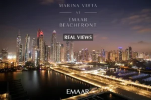Marina Vista at Emaar Beachfront by Emaar real views of Dubai Marina skyline at night with illuminated waterfront and city lights in Dubai - Presented by Tohid Fetrat
