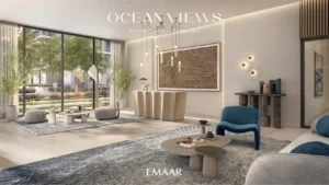 Ocean Views at Rashid Yachts & Marina by Emaar lobby interior with modern seating, reception desk, and garden view in Dubai - Presented by Tohid Fetrat